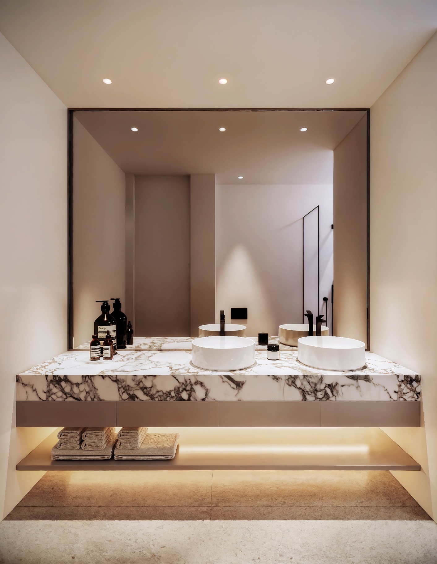 Bathroom — marble vanity & mirrored volume
